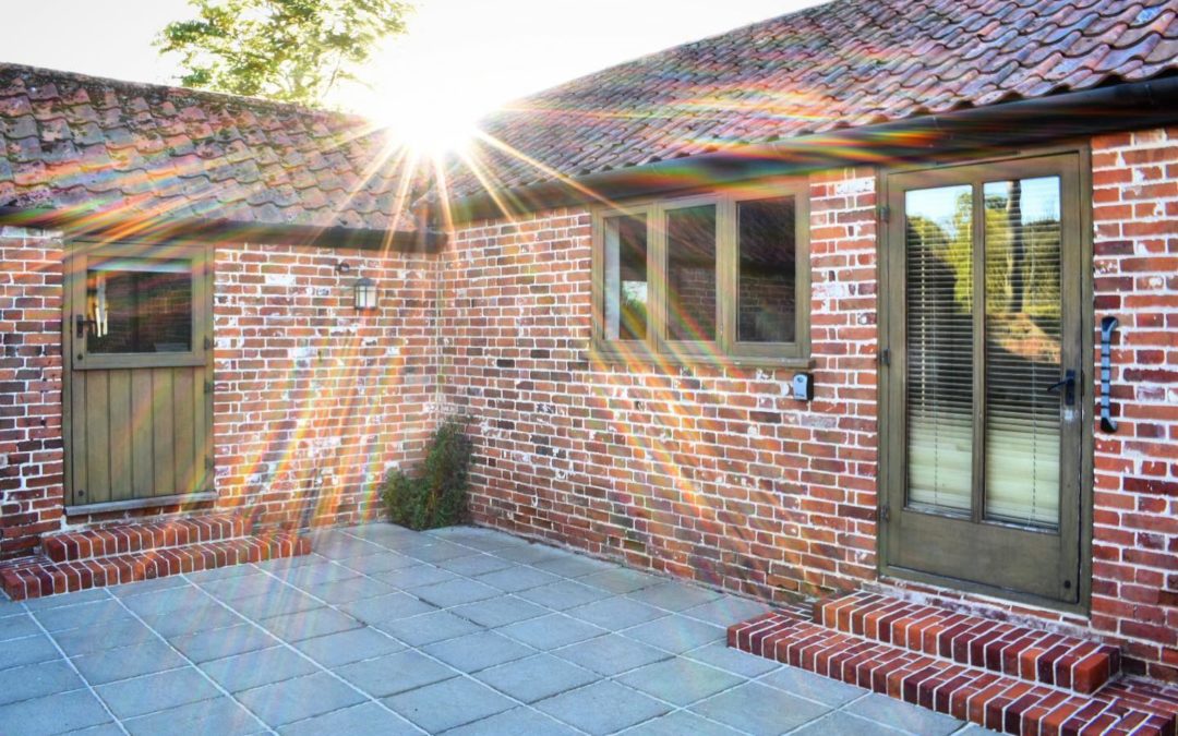 Sunshine shining over the roof of Little Owl Cottage.